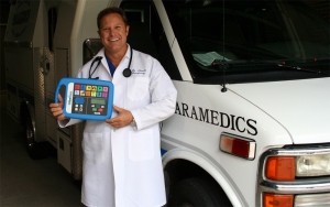 Dr. Donald Linder with the Emergency Instruction Device outside his hospital in Cedar Rapids, IA.